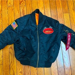 Kids Alpha Industries MA-1 bomber jacket featuring Knuckleheads artwork.